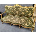 A heavy quality gilt and upholstered 3 seater settee with carved decoration, 183 x 114 x 66cm.
