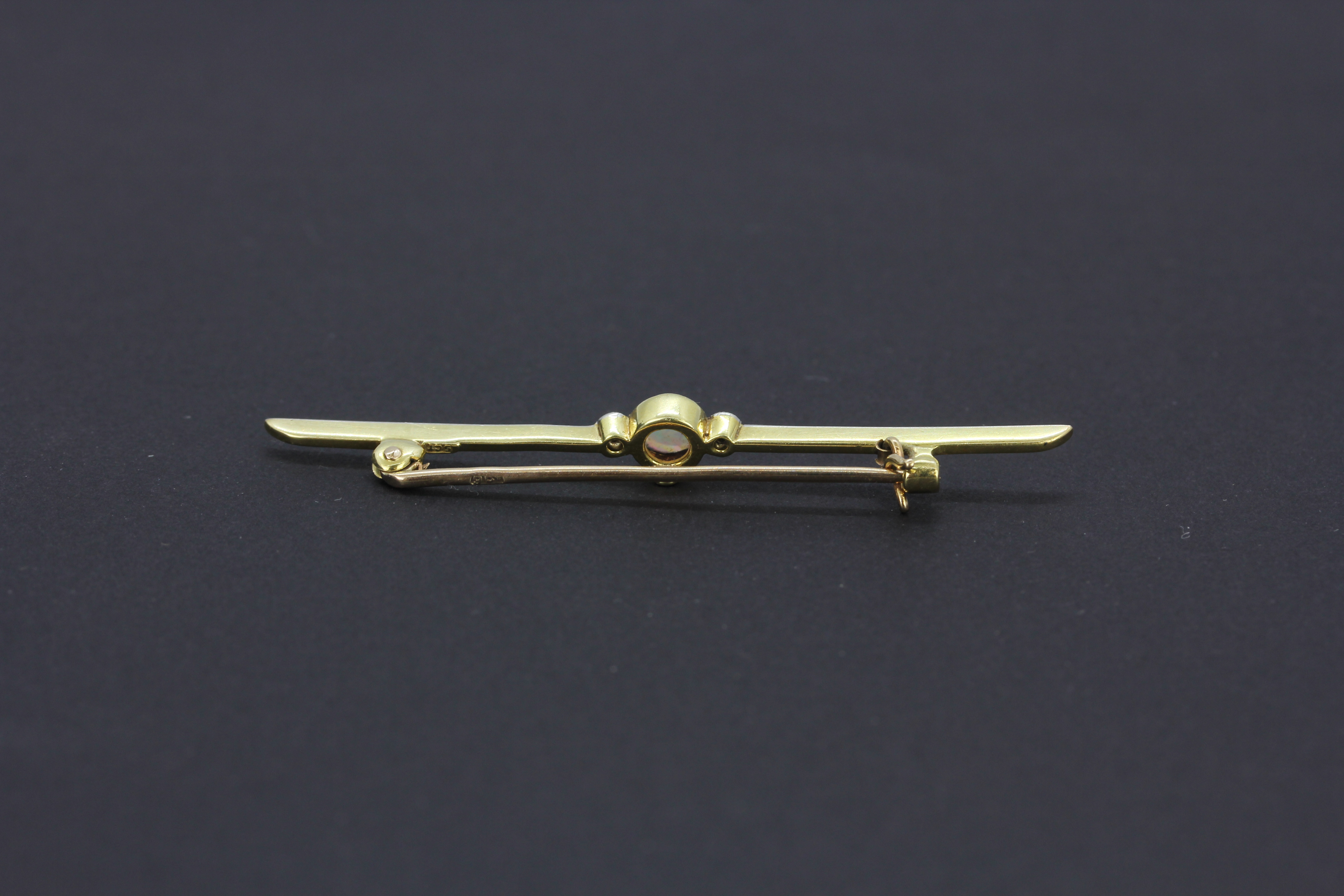 A 15ct yellow and white gold opal and diamond set bar brooch, with 9ct yellow gold (stamped 9ct) - Image 6 of 6