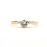An 18ct yellow and white gold diamond set solitaire ring, (O.5).