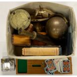 A brass telescope, brass globe and other items.