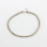 An 18ct white gold (stamped 750) bracelet set with brilliant cut diamonds, approx. 4ct overall, L.