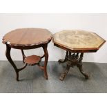 A carved mahogany two-tier table together with an octagonal carved mahogany side table on castors,