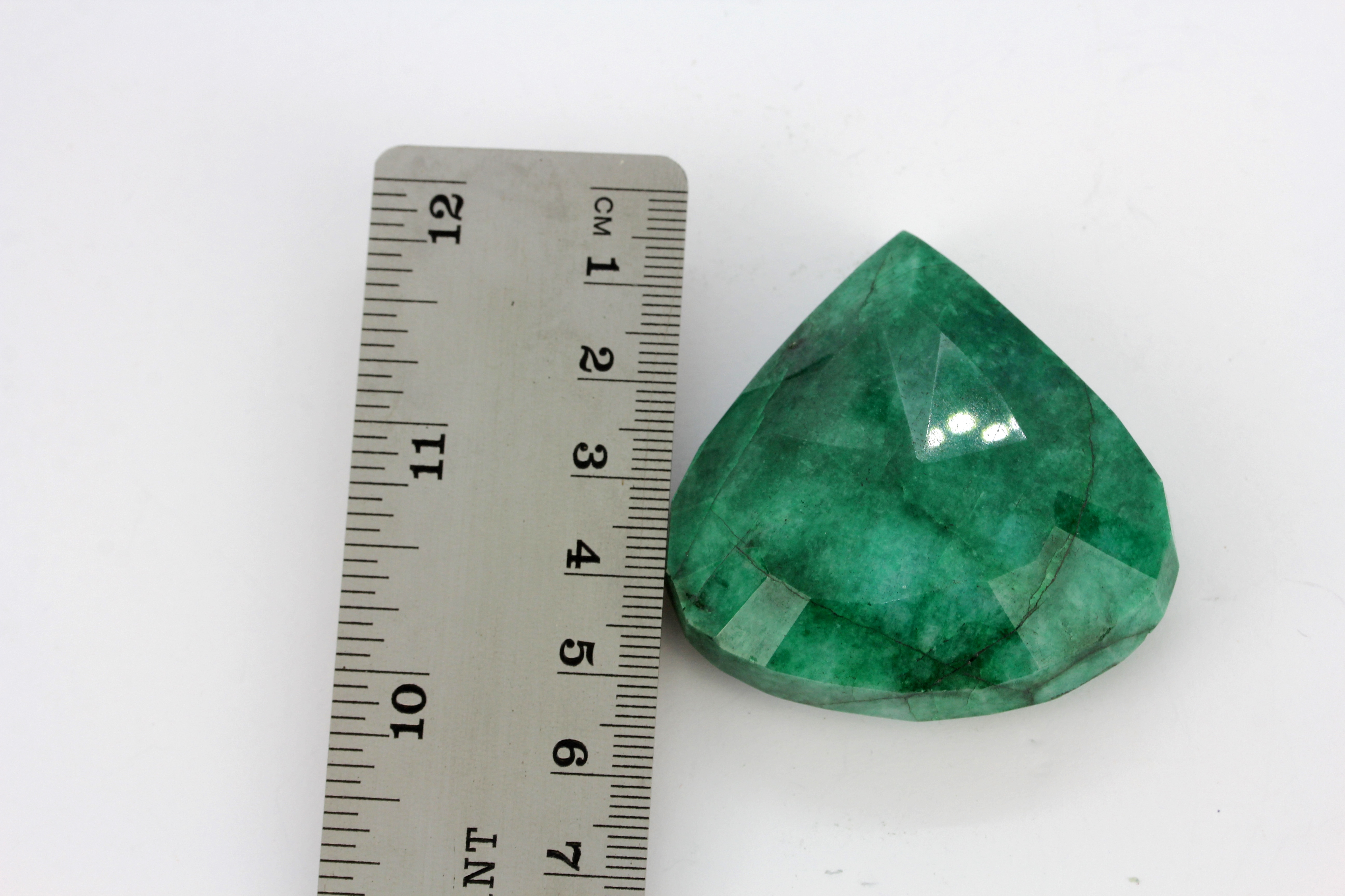 A large unmounted emerald, 5 x 5.1 x 2cm. - Image 3 of 4