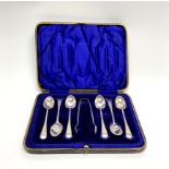 A cased set of hallmarked silver spoons and sugar tongs.