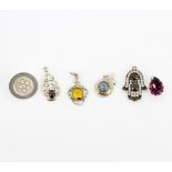 A bag of five silver gemstone set pendants, together with a silver tie pin.