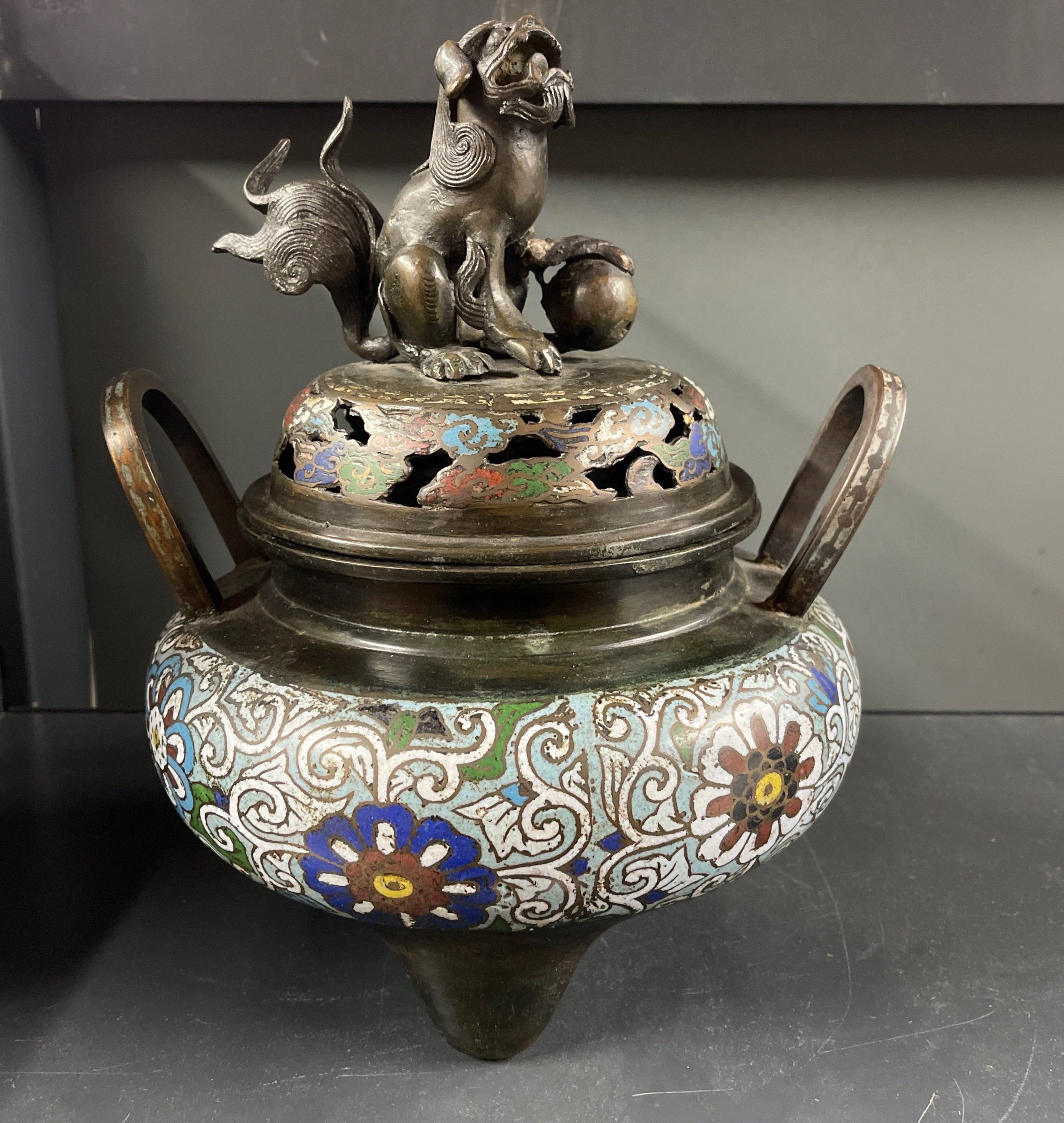 A Chinese enamelled censer, mounted with a lion dog, H. 27cm.