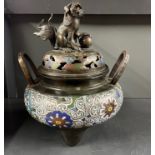 A Chinese enamelled censer, mounted with a lion dog, H. 27cm.