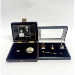 A Windsor & Allen Royal Diamond wedding anniversary coin and ring with a further small group of