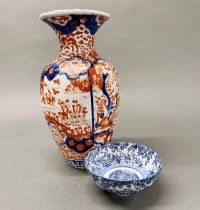 An Imari fluted vase, H. 30cm, with an Imari bowl.