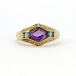 A 9ct yellow gold ring set with fancy cut amethyst and blue topaz and diamonds, (T.5).