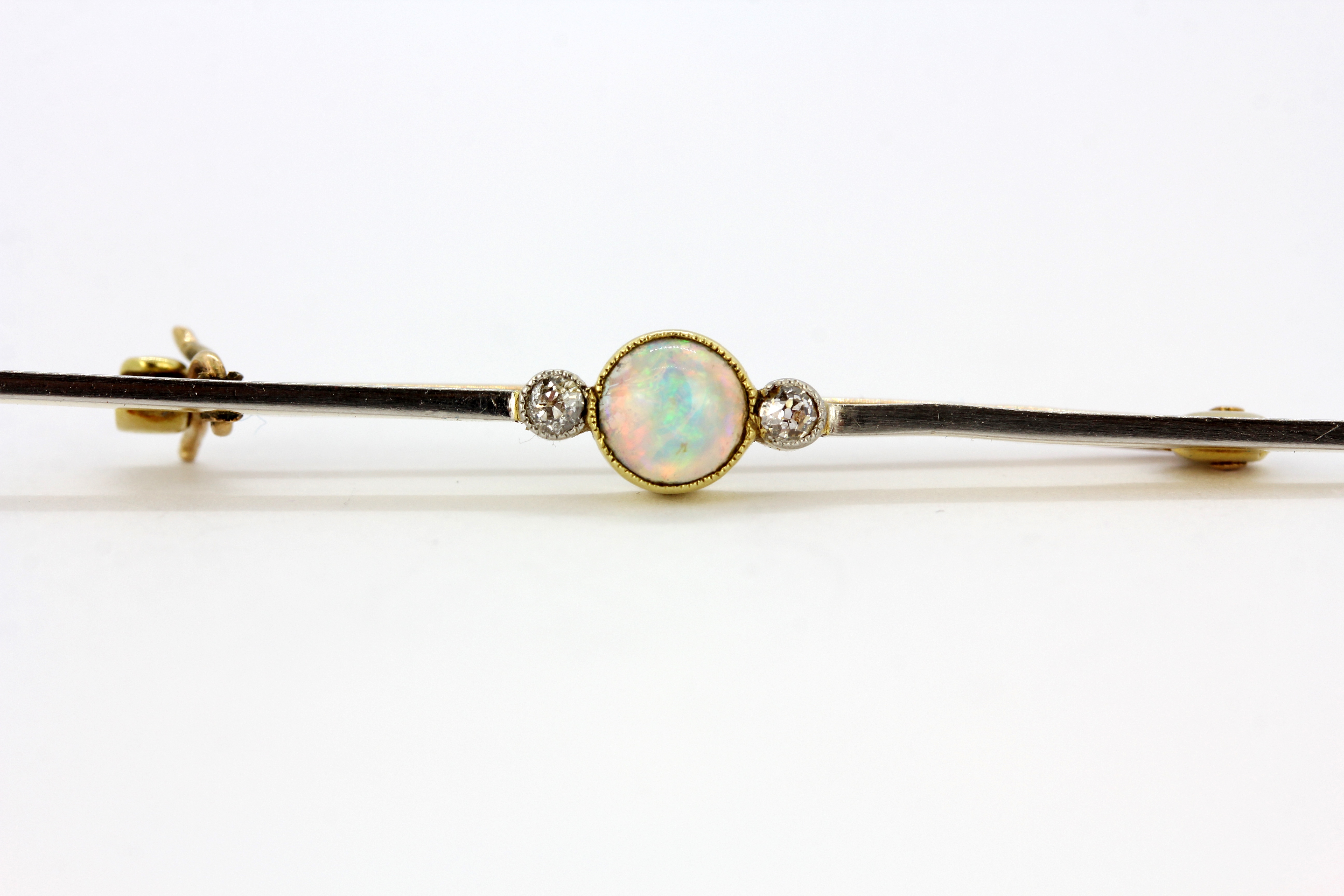 A 15ct yellow and white gold opal and diamond set bar brooch, with 9ct yellow gold (stamped 9ct) - Image 3 of 6