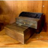 An oak stationery rack, W. 34cm, with two boxes.