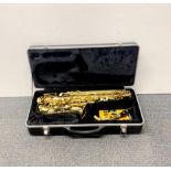 A cased Prelude by Conn-Selmer saxophone.