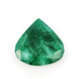 A large unmounted emerald, 5 x 5.1 x 2cm.