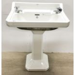 A Royal Doulton Vitreous China bathroom basin and pedestal, 86 x 63 x 46cm.