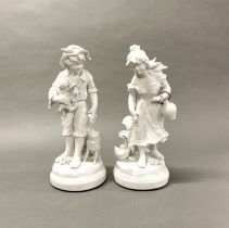A pair of French bisque porcelain figurines, H. 33cm.