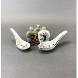 Two Chinese inside painted snuff bottles, together with a hand painted porcelain snuff bottle and