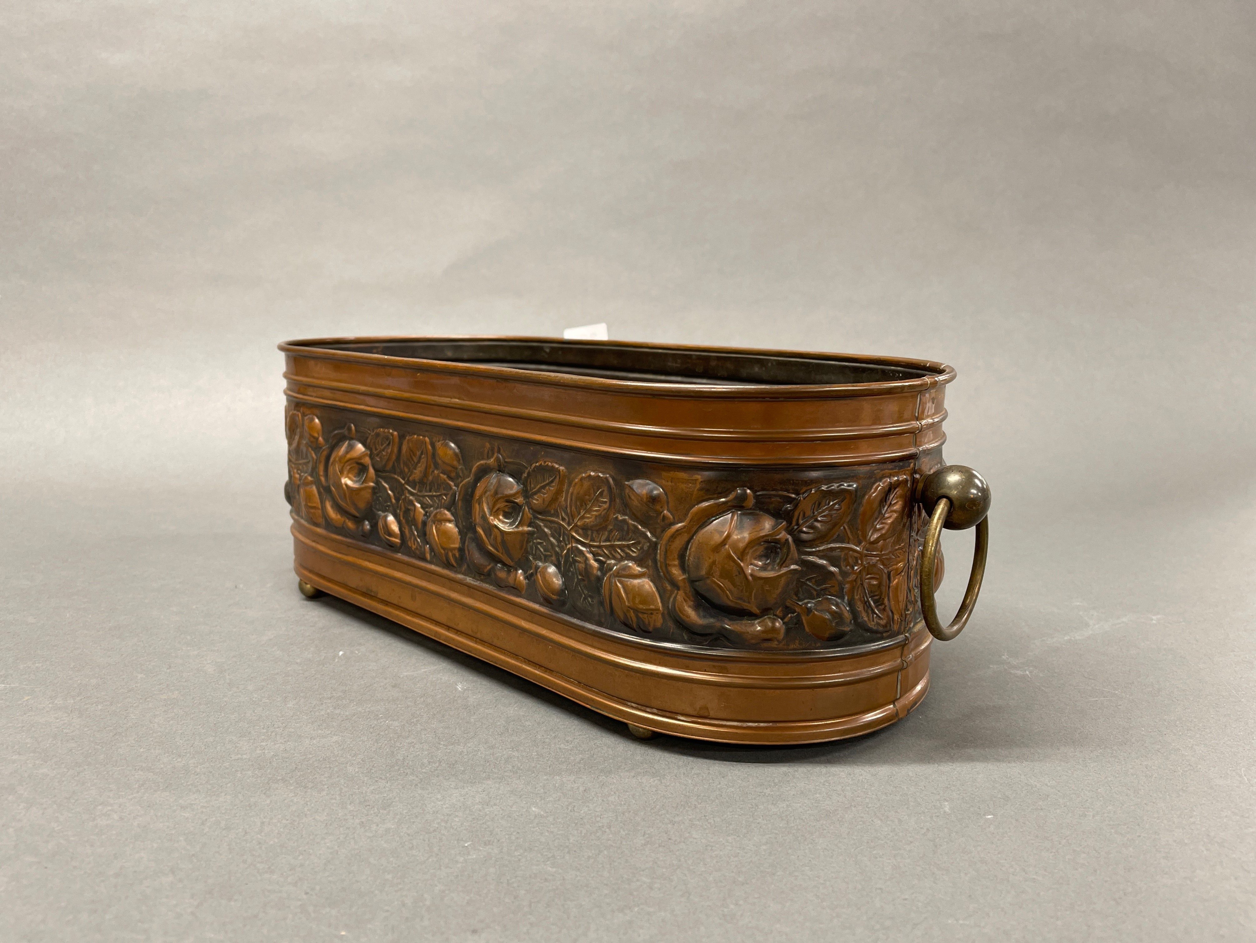 A hammered copper planter, W. 46cm. - Image 2 of 2