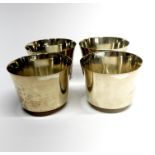 A set of four white metal (tested silver) bowls, Dia. 9cm, H. 6.5cm.