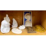 A collection of porcelain and wood religious figures and plaques, largest H. 24cm.