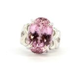 An 18ct white gold ring set with a large oval cut kunzite, stone 1.7cm.(N.5).