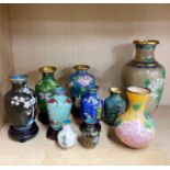A collection of 9 Chinese cloisonne and one Champleve vases, tallest H. 19cm.