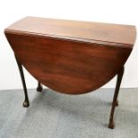 A mahogany drop leaf table with ball and claw feet, 93 x 82cm.
