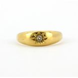 An 18ct yellow gold gypsy ring set with an old cut diamond, (T.5).