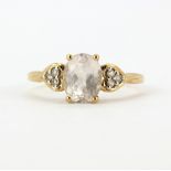 A 9ct yellow gold stone set ring, (T.5).