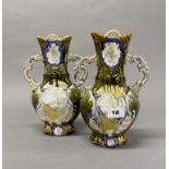 A pair of Continental Majolica style porcelain vases, H. 27cm.