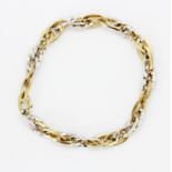 An Italian Indaerre 9ct yellow and white gold (stamped 375) bracelet, L. 20cm.