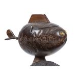 A CARVED COCONUT BOX IN THE FORM OF A FISH