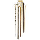 Ø A FINE GOLD-MOUNTED NARWHAL AND MARINE IVORY WALKING STICK