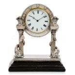 A DECORATIVE SILVER MANTLE CLOCK PRESENTED TO THE OFFICERS' WARDROOM OF THE R.Y. OSBORNE, CIRCA