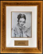 Bette Davis signed 19x15 overall vintage black and white photo framed and mounted to a
