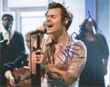 Singer Harry Styles signed 10x8 colour photo in excellent condition. Harry Edward Styles is an