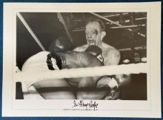 Sir Henry Cooper signed 19x14 black and white print pictured in action against Cassius Clay. Sir