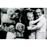 Barbara Windsor signed Carry On 12x8 black and white montage photo. Dame Barbara Windsor DBE (born