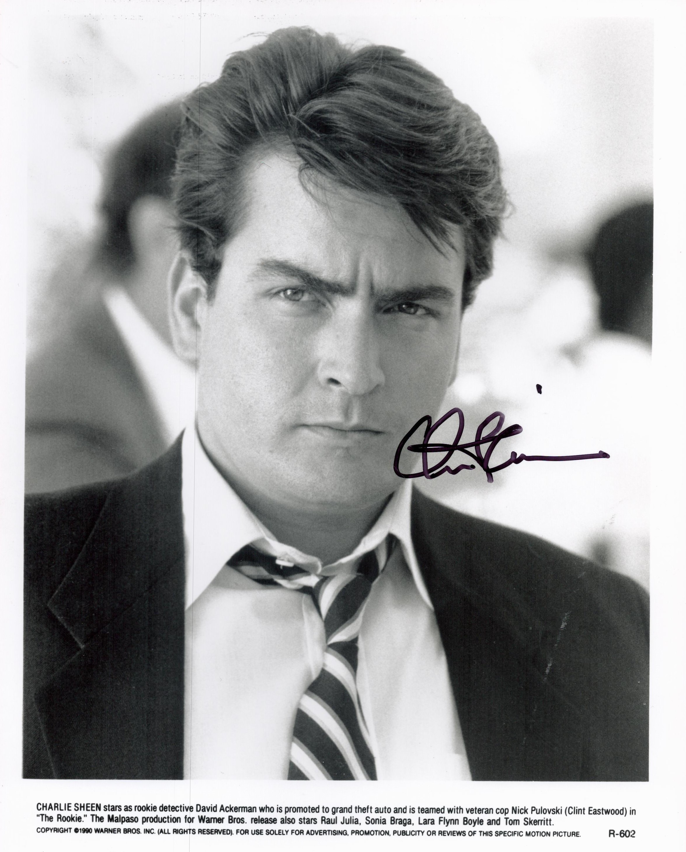 Charlie Sheen Actor Signed The Rookie 8x10 Promo Photo. Good condition. All autographs come with a