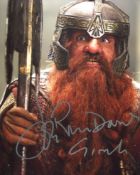 Lord of the Rings movie 8x10 photo signed by Jonathan Rhys-Davies as Gimli. Good condition. All