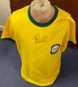 Pele Handsigned Retro 1970's Brazil Shirt. Signature states 'Pele' Yellow and Green in Colour,