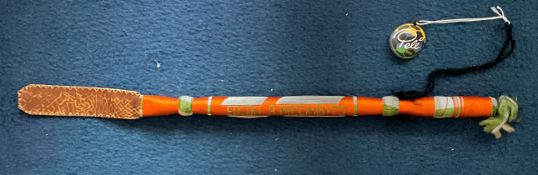 Pele Collection Pele Riding Crop. A horse riding crop owned by Pelé, decorated in orange thread with