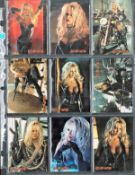 Barb. Wire Topps Trading Embossed Cards E1-E12, Full Complete Set. Housed in plastic sleeves. Good