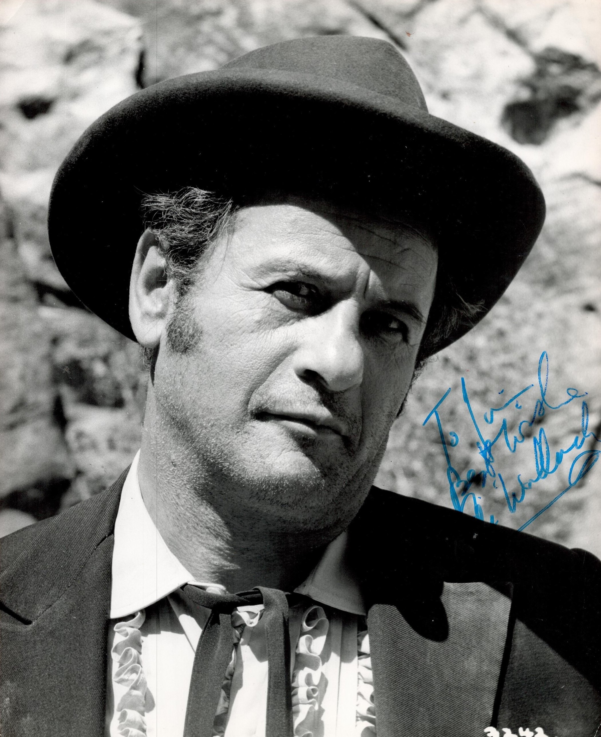 Eli Wallach signed 10x8 black and white photo. Good condition. All autographs come with a