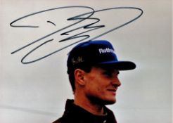 F1 Legend David Coulthard Handsigned 6x4 Colour Photo. Photo shows Coulthard in his younger days