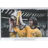 Football. Charlie George Signed 18x12 black and white photo. Photo shows George Holding the 1971