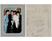 Masquerade 6 collection with 2 photographs, one of which is signed on the frame from the band to