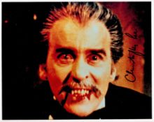 Dracula Christopher Lee signed 10 x 8 slightly grainy horror photo. Good condition. All autographs