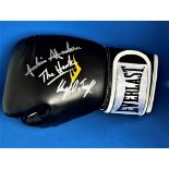 Boxing Julian Jackson and his son Clayton signed Everlast black glove. Signatures obtained at the