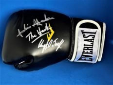 Boxing Julian Jackson and his son Clayton signed Everlast black glove. Signatures obtained at the